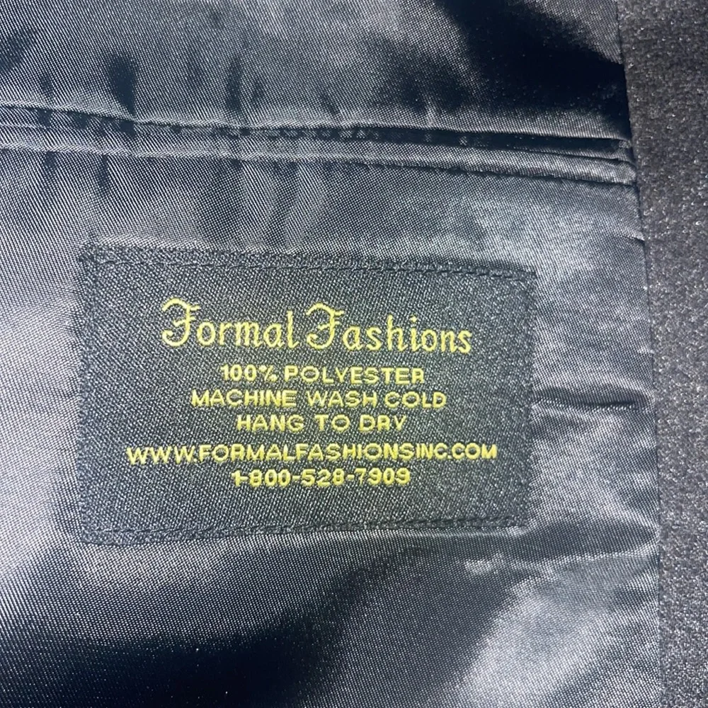 Formal Fashions men’s black tuxedo jacket and pants. Jacket 38S, Pants 34x34